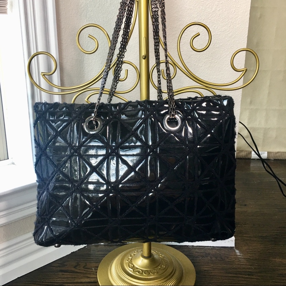 Big Buddha black patent quilt tote.